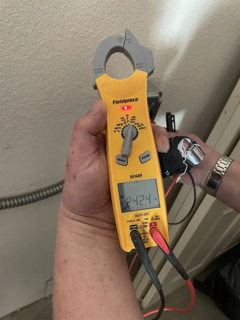 Voltage testing with clamp meter during Generator Installation in Putnam